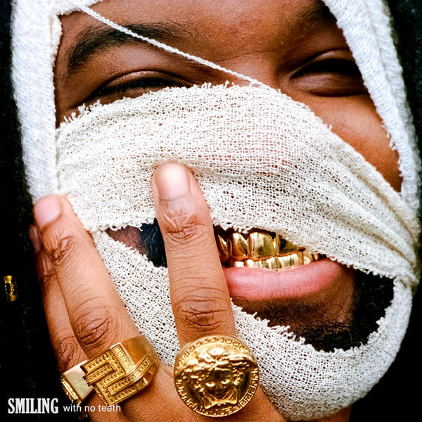 GENESIS OWUSU - SMILING WITH NO TEETH